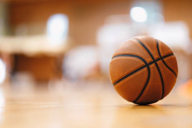 Close Up Image Of Basketball Ball Over Floor In The Gym Orange Basketball Ball On Wooden